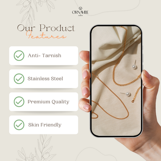 Hand holding a phone displaying jewelry with product features listed on a beige background